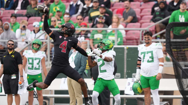 Sep 30, 2023; Stanford, California, USA; Stanford Cardinal cornerback Zahran Manley (4) defends a pass intended for Oregon Ducks wide receiver Gary Bryant Jr. (2) during the second quarter at Stanford Stadium. Mandatory Credit: Darren Yamashita-USA TODAY Sports